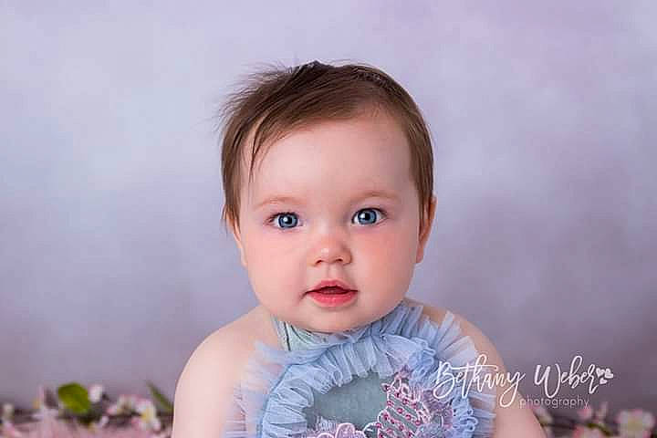 Veda is registered to the contest to win money with this photo: baby, brown_hair, cheek, child, child_model, eye, face, happy, head, iris, lip, nose, person, photograph, photography, pink, portrait, portrait_photography, skin, smile
