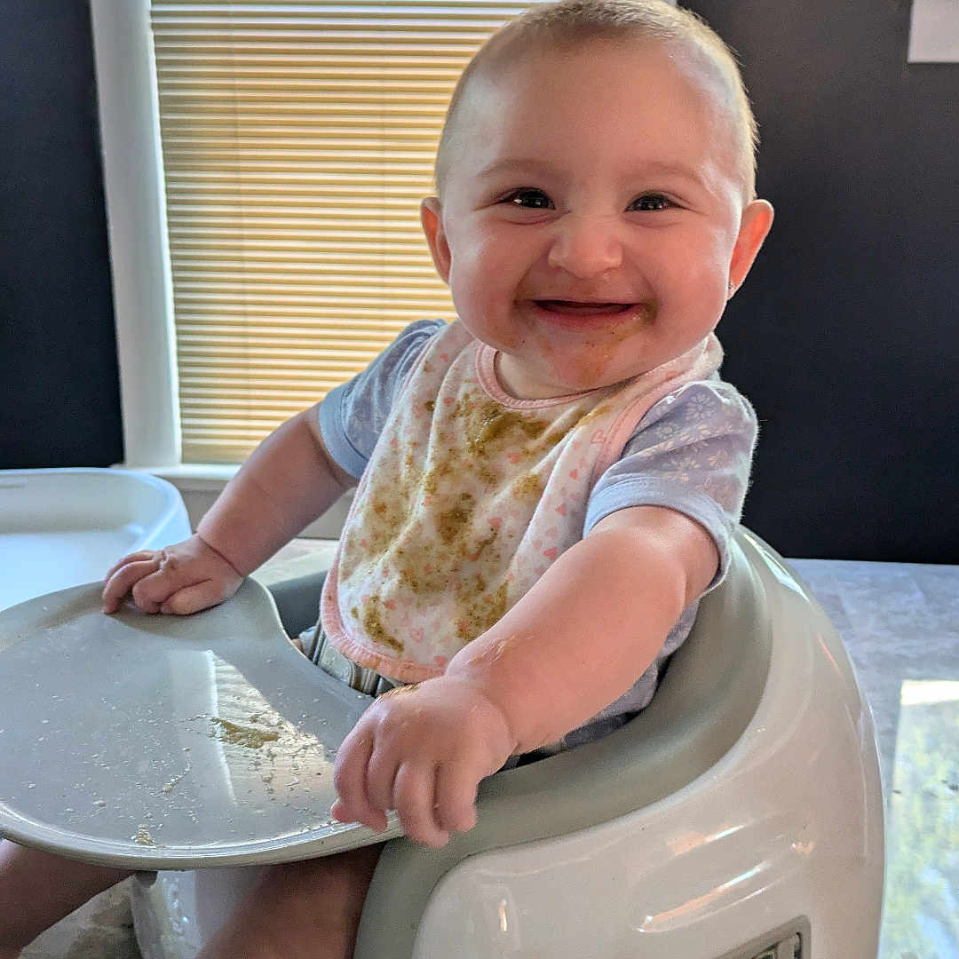 Lola is registered to the contest to win money with this photo: baby, bathroom, bodypart, cream, dessert, face, finger, hand, happy, head, homedecor, indoors, person, photography, portrait, potty, room, sitting, smile, toilet