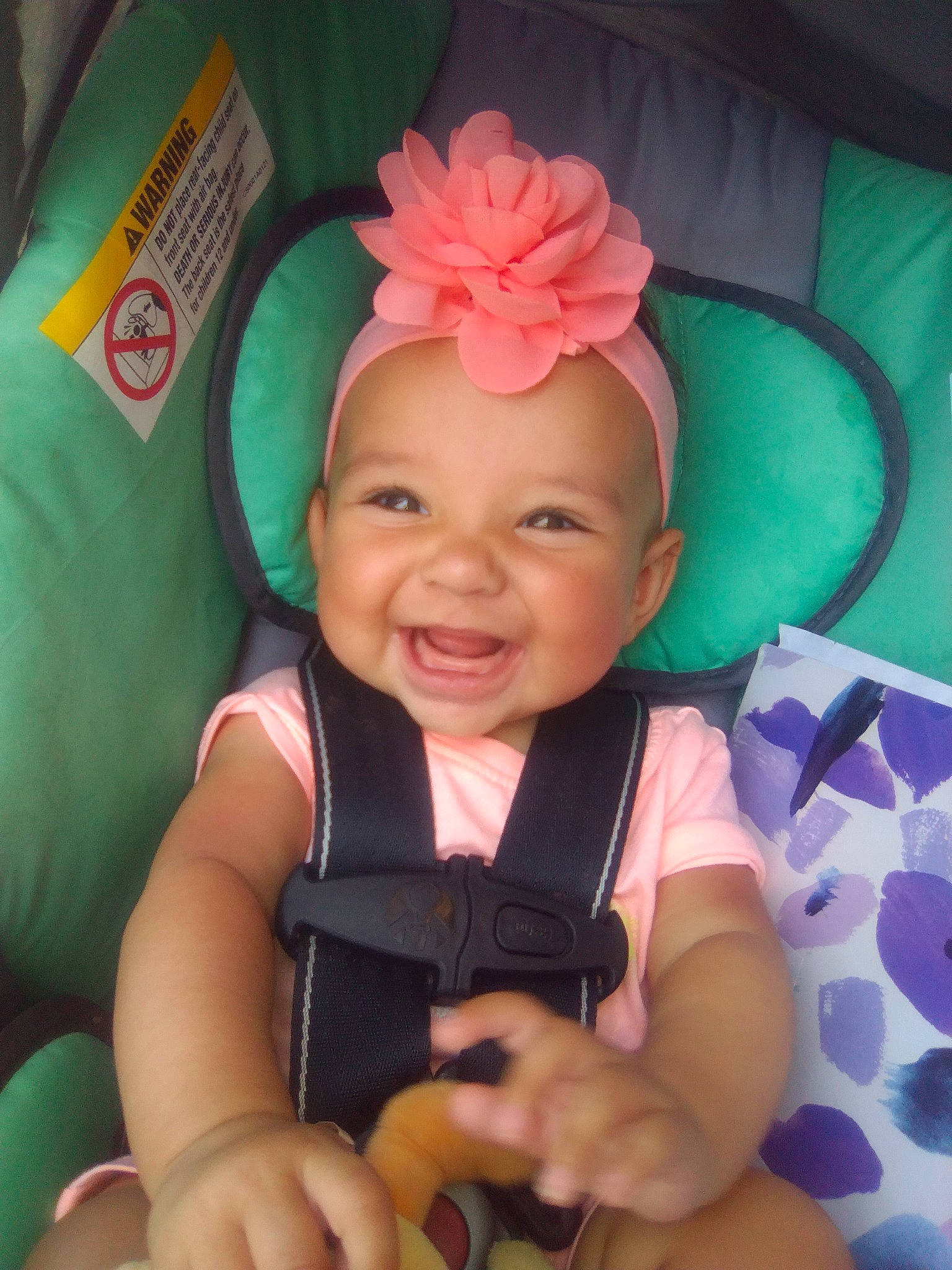 Wynter is registered to the contest to win money with this photo: arm, baby, baby_toddler_clothing, cheek, child, comfort, eye, eyelash, finger, fun, happy, headpiece, headwear, human_body, joy, nose, person, pink, product, skin