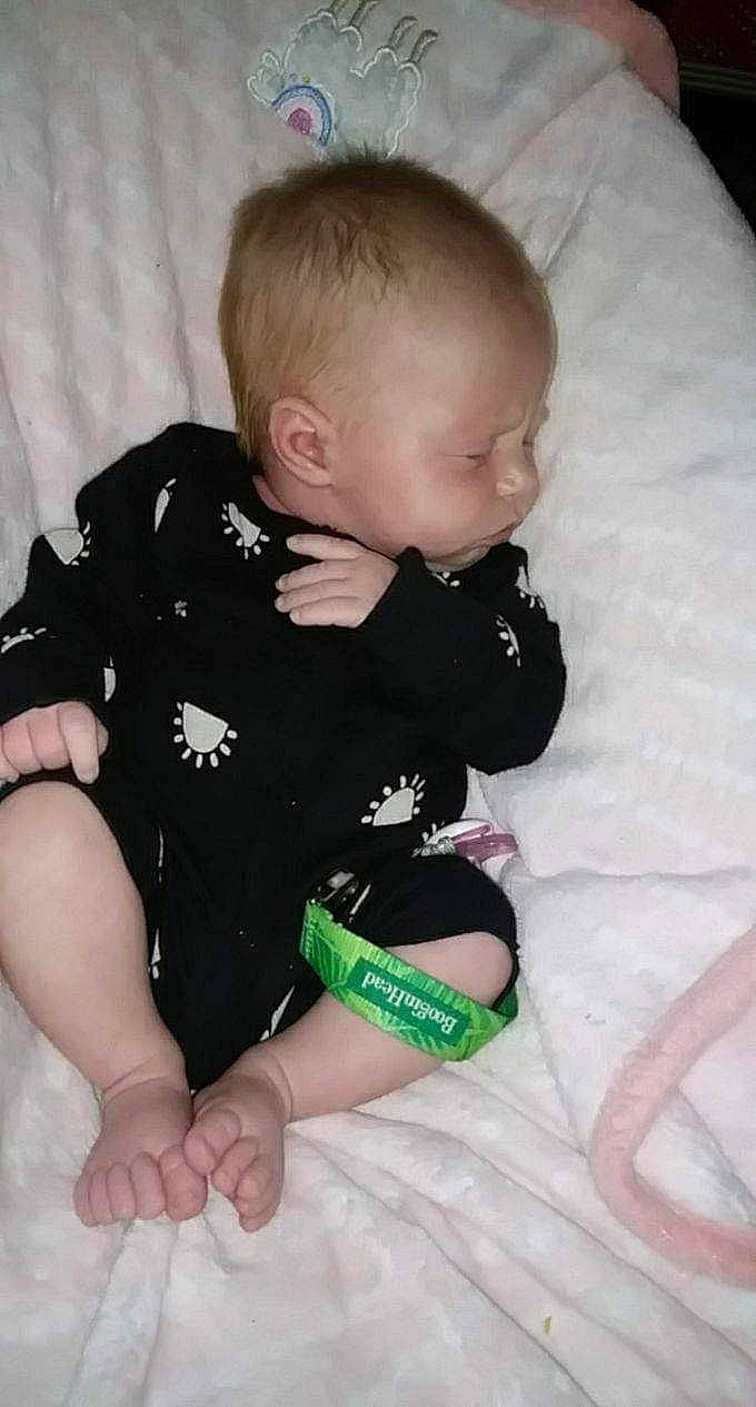 Bella joined the competition — help win amazing prizes! baby, baby_toddler_clothing, child, comfort, elbow, finger, hand, head, human_body, human_leg, knee, lap, person, sitting, skin, sleeve, sock, stomach, t_shirt, thigh