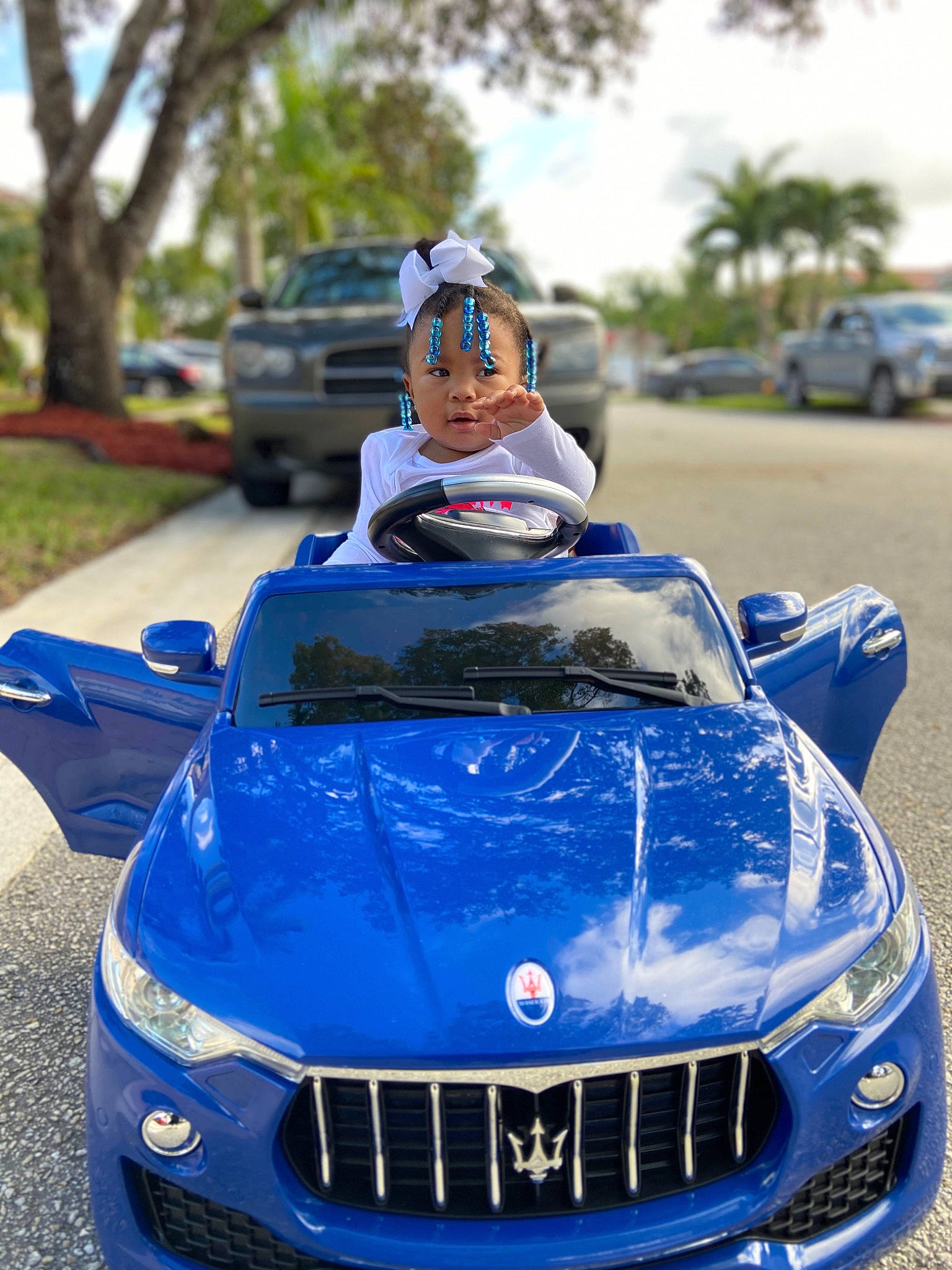 Chloe joined the competition — help win amazing prizes! automotive_design, blue, bmw, car, city_car, coupe, grille, hood, land_vehicle, luxury_vehicle, mid_size_car, motor_vehicle, performance_car, person, personal_luxury_car, sedan, sky, sports_car, supercar, vehicle