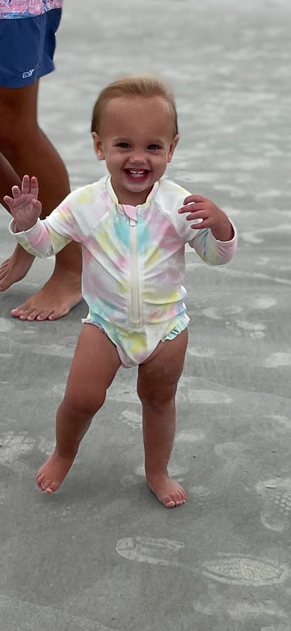 Ryder is registered to the contest to win money with this photo: arm, baby, baby_toddler_clothing, barefoot, child, foot, fun, gesture, hand, happy, head, human_body, human_leg, joy, person, skin, sleeve, smile, thigh, thumb