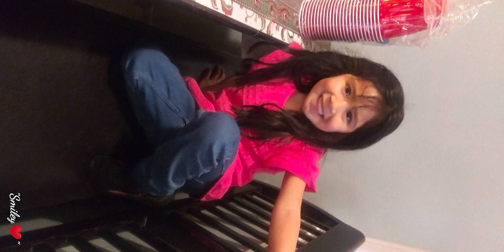 Itzel is registered to the contest to win money with this photo: black_hair, child, electronic_instrument, electronic_musical_instrument, flooring, fun, happy, human_leg, joy, keyboard, leisure, magenta, musical_instrument, musical_instrument_accessory, person, piano, pink, room, sitting, smile