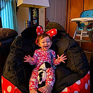 Blakely joined the competition — help win amazing prizes! child, toddler, smiling, pajamas, minnie_mouse_ears, bean_bag_chair, puppy, dog, indoor, lamp, door, high_chair, happy, feet, hand, person, furniture, curtain, home, cute