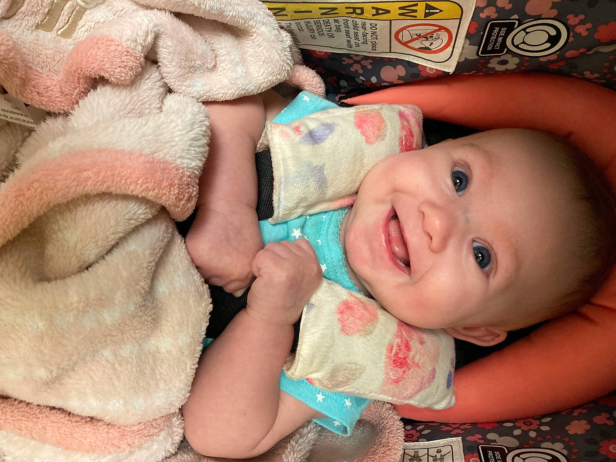 Raelynn is registered to the contest to win money with this photo: baby, baby_toddler_clothing, cheek, eye, facial_expression, finger, hand, happy, head, human_body, joy, lip, mouth, nail, nose, organ, person, pink, skin, smile