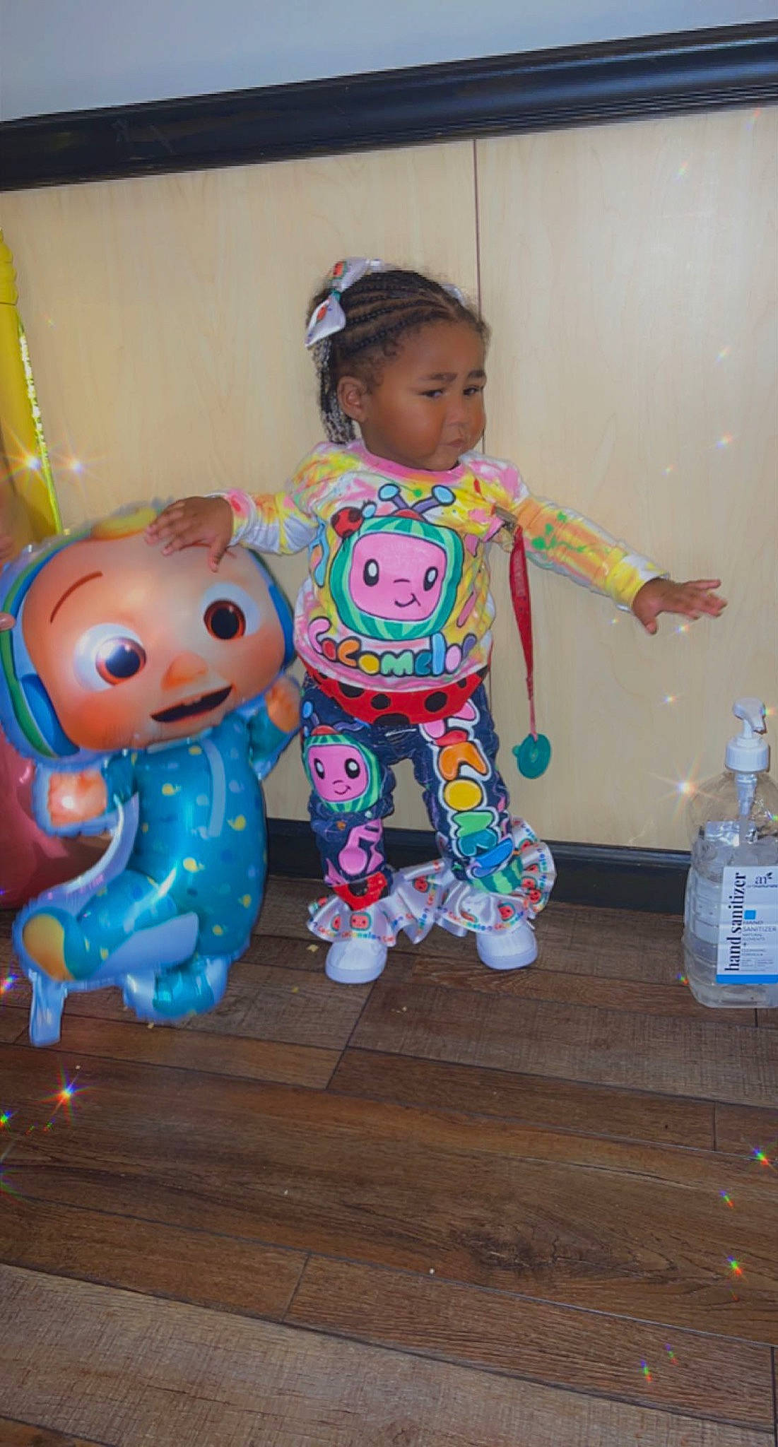 Taelynn joined the competition — help win amazing prizes! baby, baby_toddler_clothing, bottle, bottled_water, child, costume, drinking_water, event, flooring, fun, happy, hardwood, party_supply, person, pink, plastic_bottle, purple, smile, toddler, water_bottle