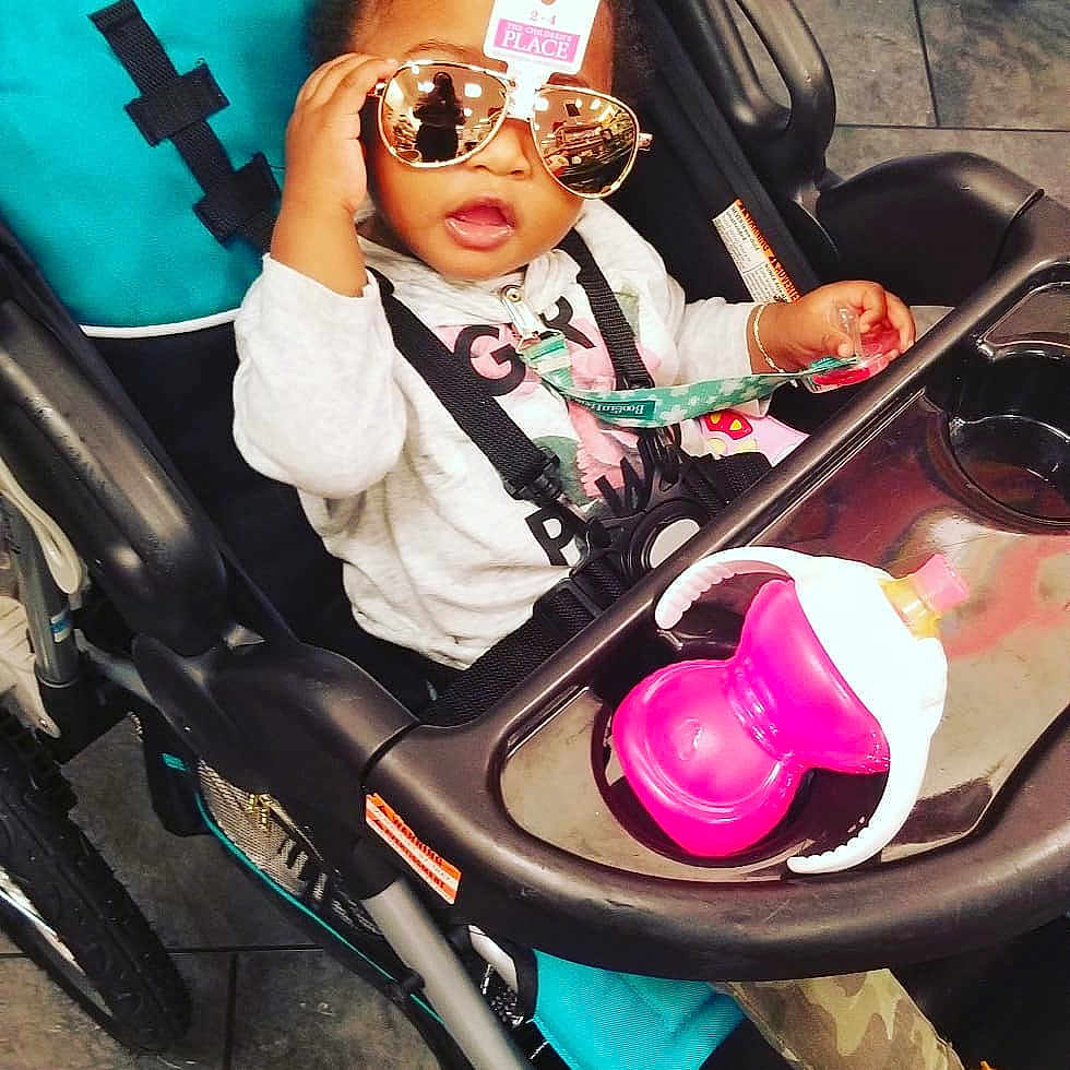 Kiana is registered to the contest to win money with this photo: car, cool, eyewear, fashion_accessory, fun, girl, glasses, pink, product, sunglasses, vehicle, vision_care