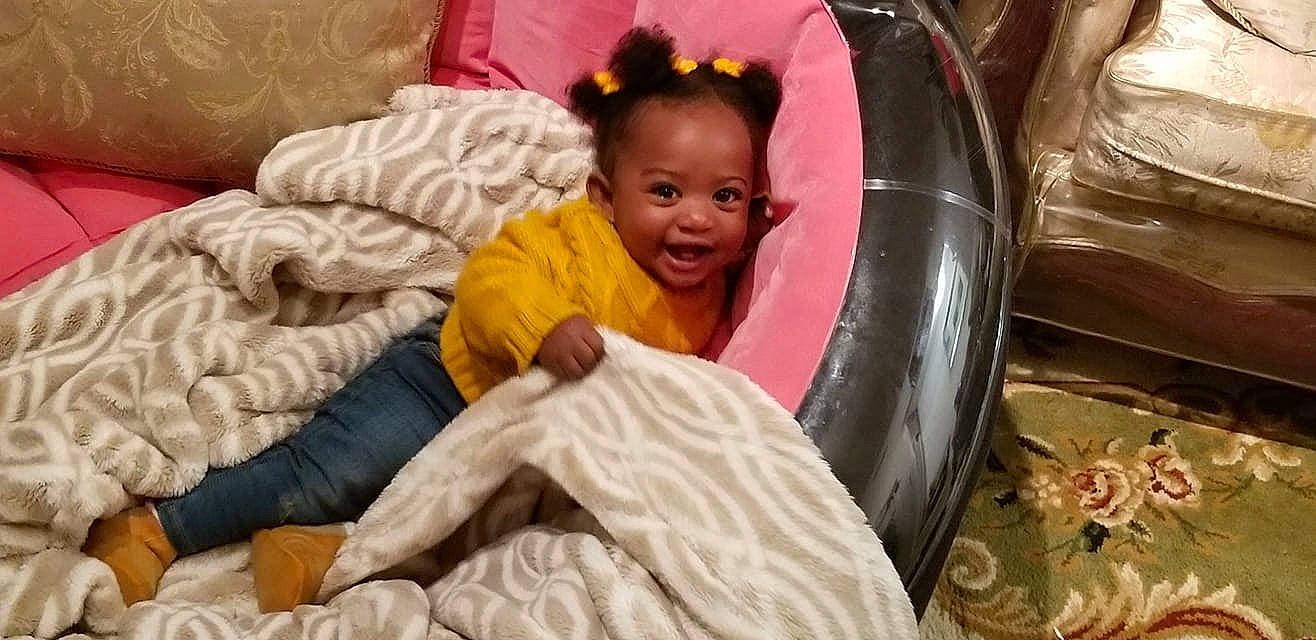 Kiana is registered to the contest to win money with this photo: child, girl, infant, person, product, toddler