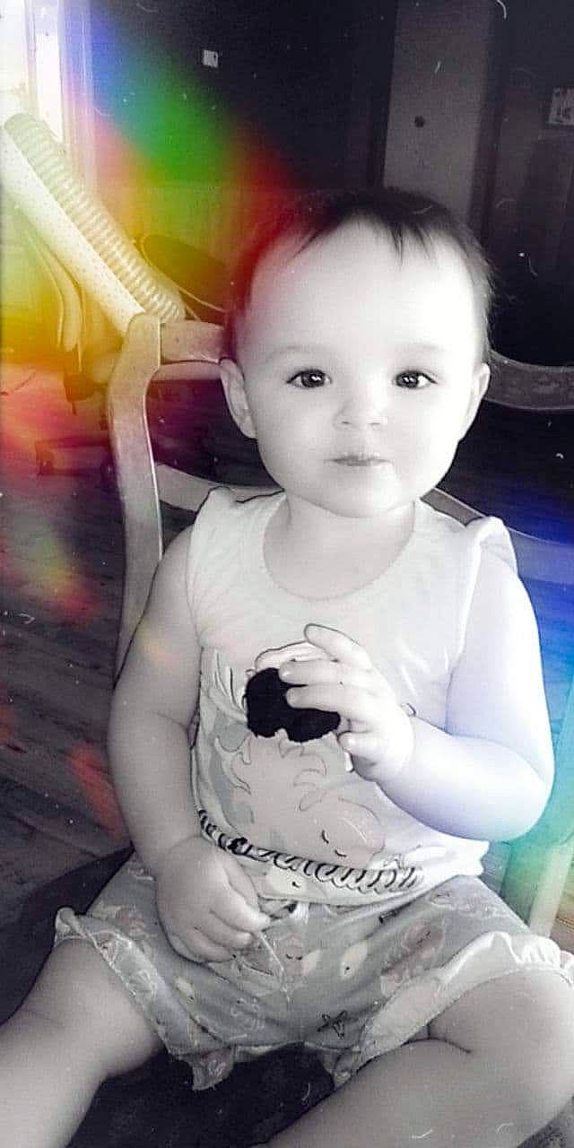 Casey is registered to the contest to win money with this photo: baby, beauty, cheek, child, cool, eye, face, fun, head, iris, lip, mouth, nose, person, photograph, sitting, skin, smile, snapshot, toddler