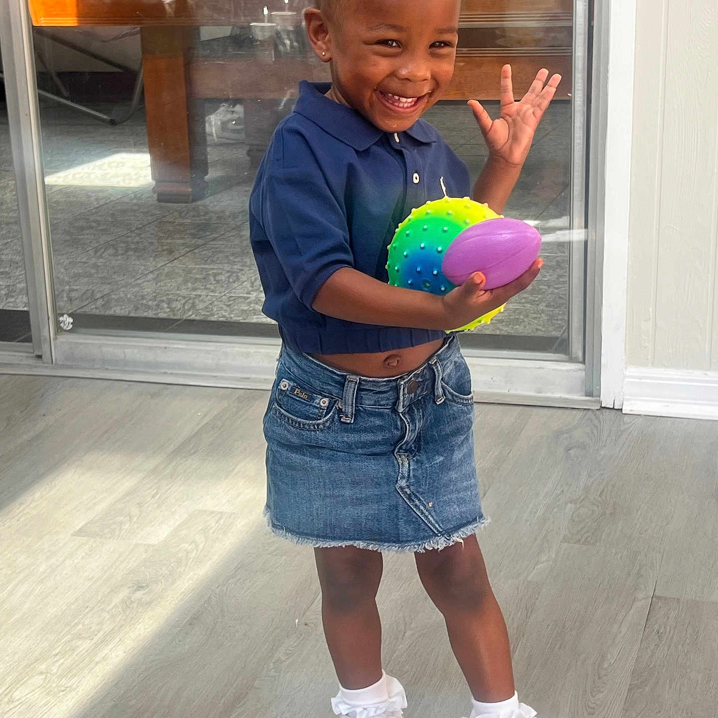Emma joined the competition — help win amazing prizes! ball, balloon, boy, child, clothing, face, football, footwear, head, male, pants, person, photography, portrait, shoe, shorts, skirt, soccer, soccerball, sphere