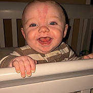Bentleigh joined the competition — help win amazing prizes! baby, bedroom, blanket, blue_eyes, child, crib, cute, face, furniture, hand, happy, holding, indoor, infant, nursery, person, sleepwear, smile, striped_clothing, toddler
