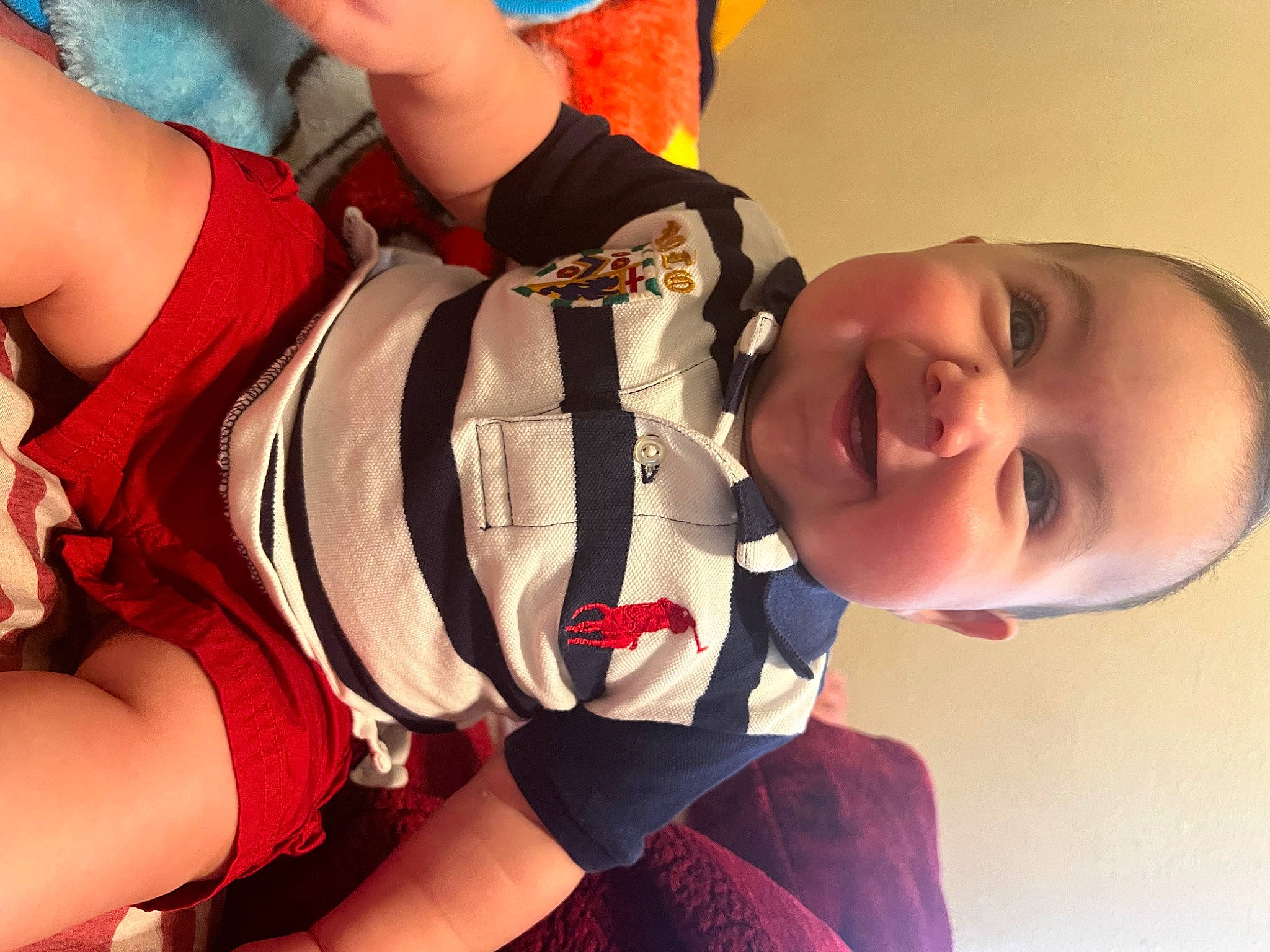 Elian joined the competition — help win amazing prizes! arm, baby, child, cool, elbow, fashion_accessory, finger, fun, gesture, hand, happy, headgear, human_leg, joy, neck, orange, person, red, smile, thigh