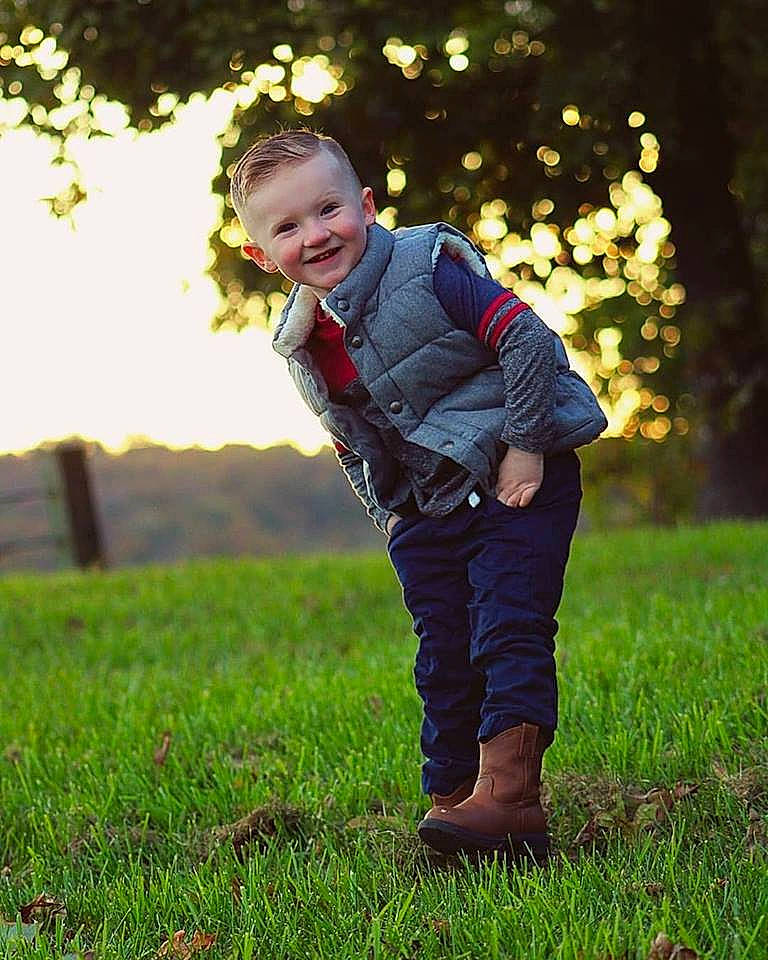 Braxon joined the competition — help win amazing prizes! boy, child, emotion, facial_expression, fun, garden, grass, green, joy, lawn, male, meadow, nature, outerwear, person, photograph, photography, plant, smile, spring