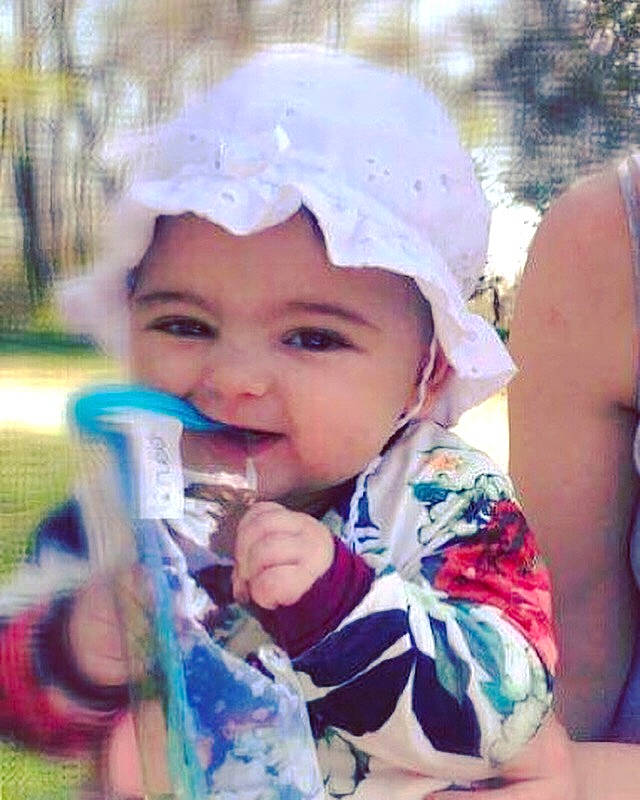 Dina participe au concours pour gagner de l'argent avec cette photo : baby, child, headgear, headwear, nose, person, play, smile, toddler