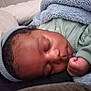Aeson is registered to the contest to win money with this photo: baby, sleeping, blanket, hat, cozy, infant, child, resting, peaceful, cute, soft, warm, portrait, closeup, toddler, fist, clothing, indoor, face, head