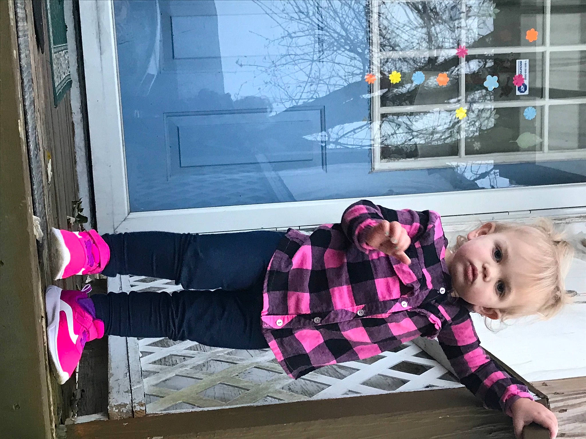 Alaina is registered to the contest to win money with this photo: fun, fur, leisure, magenta, pattern, person, pink, plaid, purple, room, shoe, sitting, sneakers, street_fashion, tartan, textile, toddler, tree, visual_arts, window