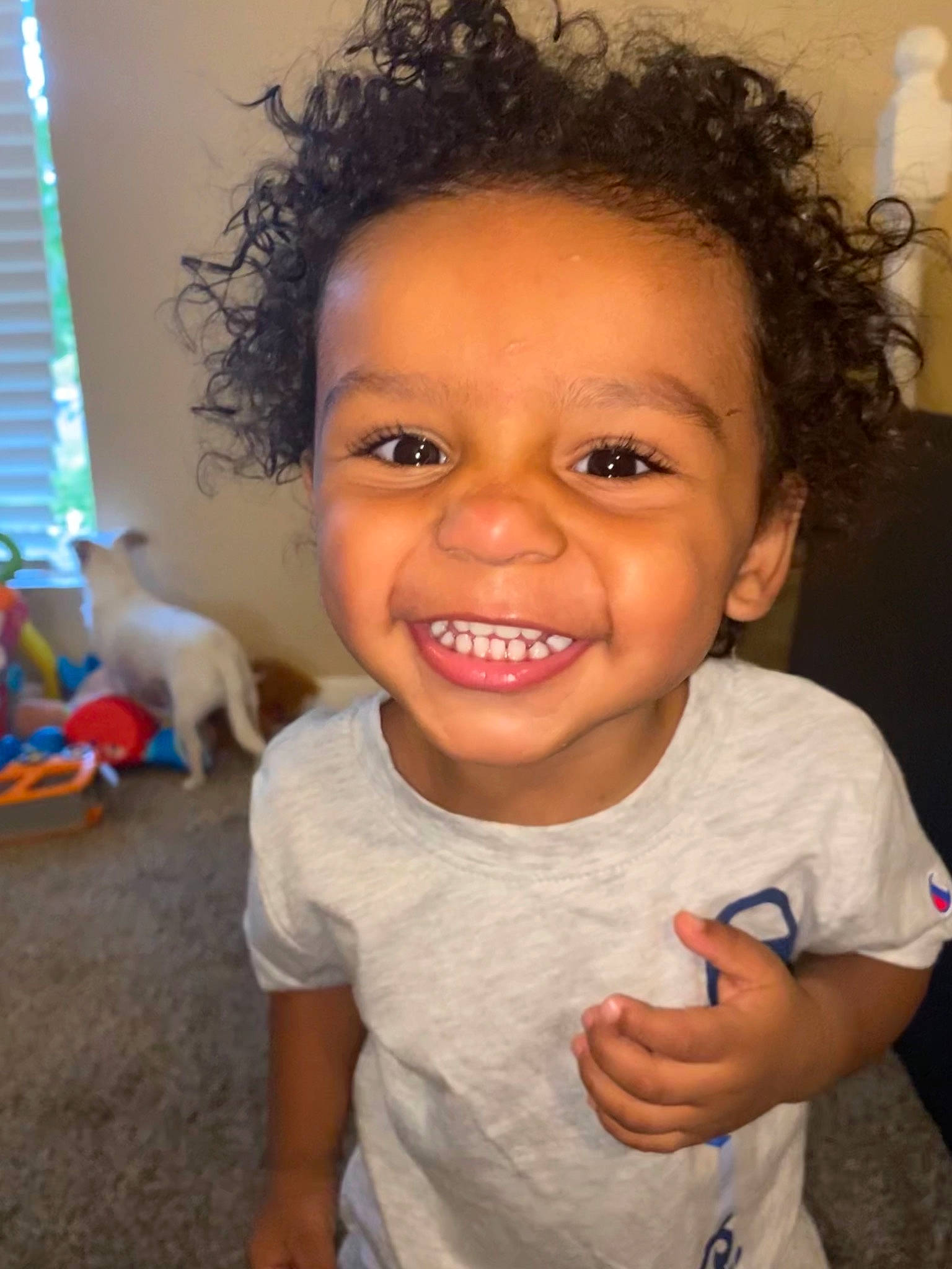 Harlem is registered to the contest to win money with this photo: arm, cheek, chin, eye, eyebrow, eyelash, face, forehead, hair, head, human_body, joint, joy, lip, mouth, nose, organ, person, shoulder, skin