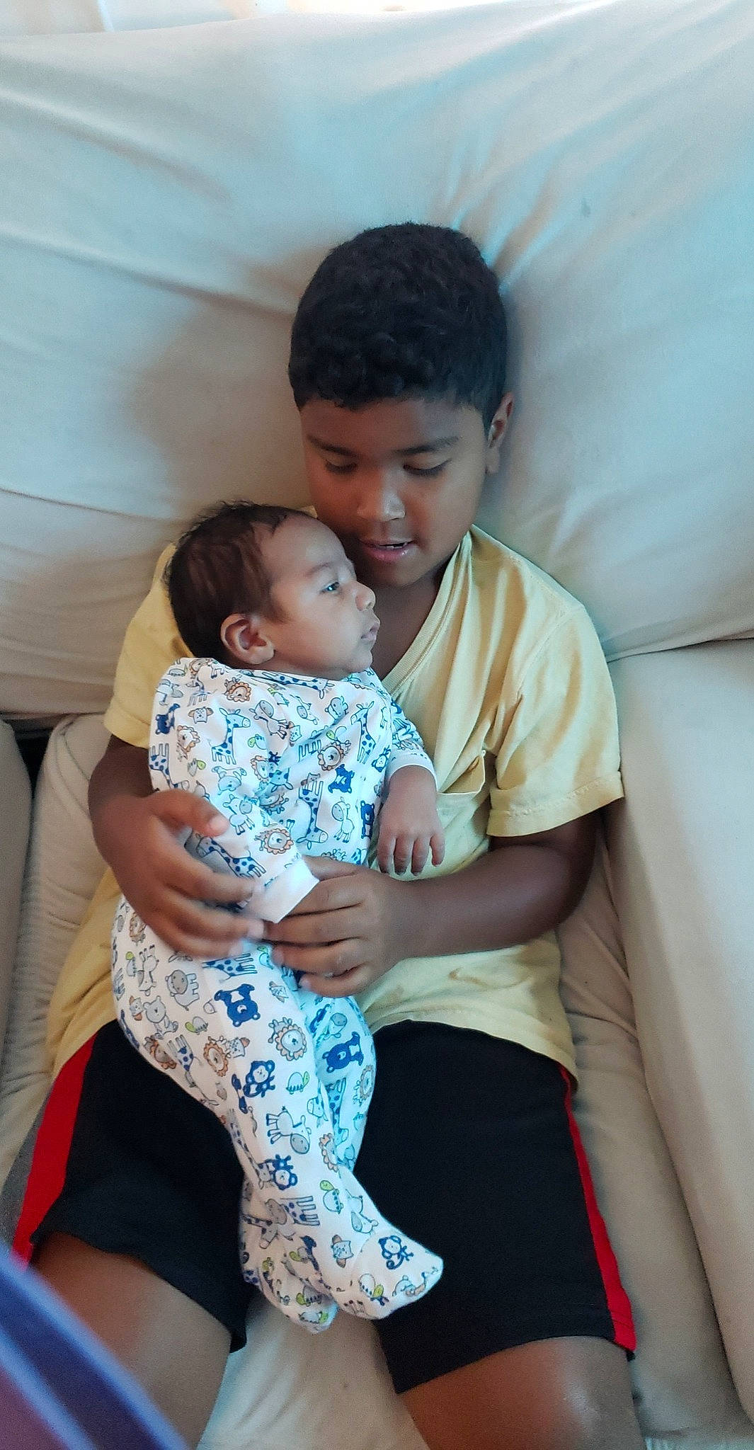 Cevynn joined the competition — help win amazing prizes! baby, chair, child, comfort, couch, dress, event, face, fun, hair, happy, head, human_body, lap, leisure, person, shoulder, sitting, skin, t_shirt