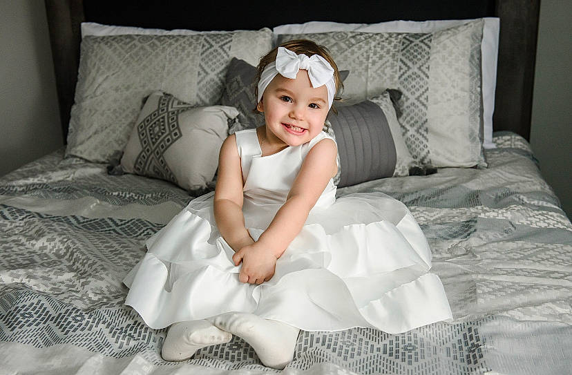 Vika is registered to the contest to win money with this photo: arm, beauty, comfort, dress, face, flash_photography, floor, flooring, hair, happy, head, headwear, human_body, iris, joy, leg, pattern, person, pink, skin