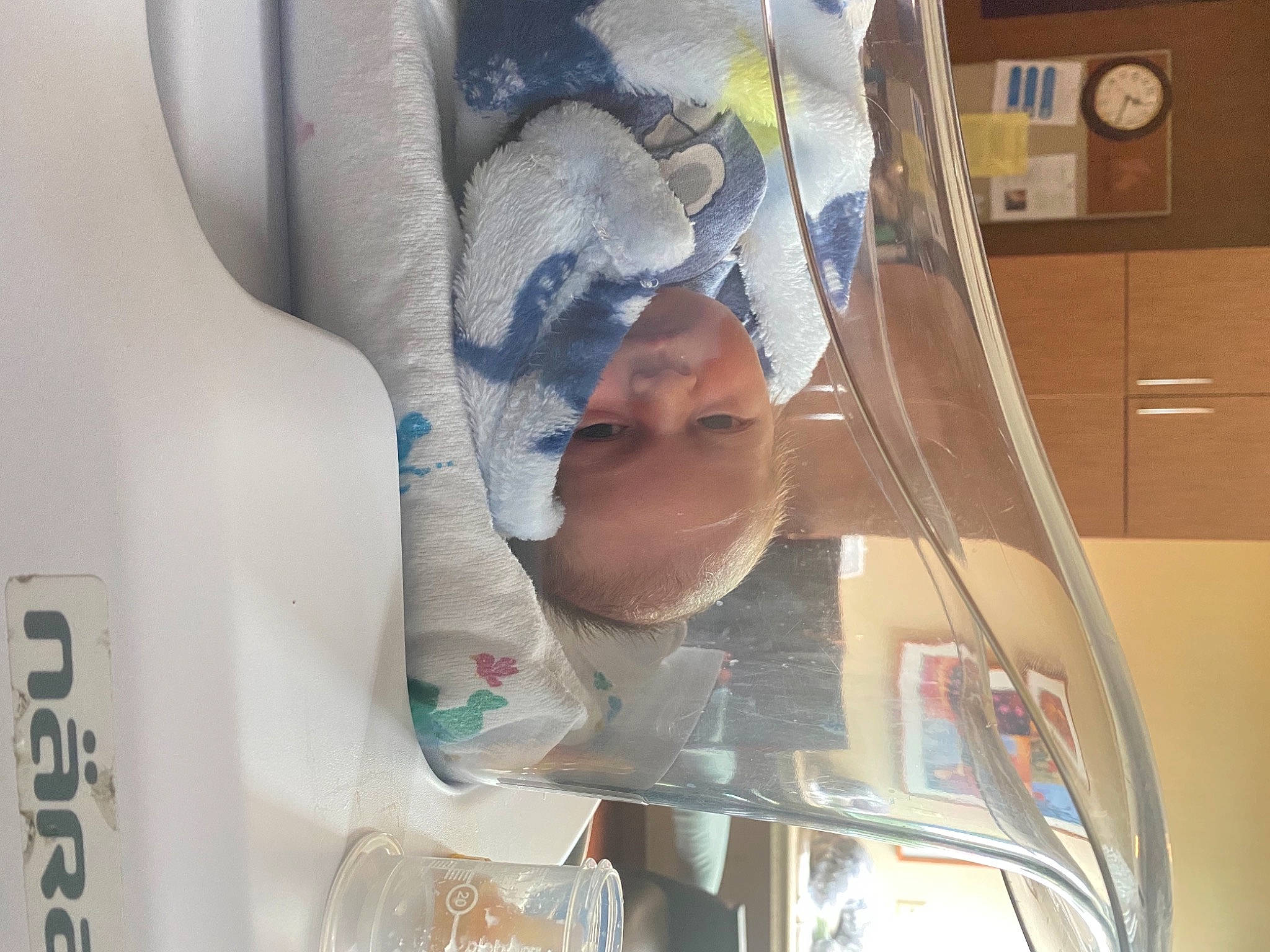 Joziah is registered to the contest to win money with this photo: baby, childbirth, clock, comfort, electrical_wiring, gas, health_care, hospital, linens, machine, medical, medical_equipment, medical_procedure, person, picture_frame, plastic, refrigerator, room, service, tableware