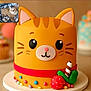 kitten, cat, cake, orange_cat, decorative_cake, candy, paw_print_blanket, cute, food, dessert, colorful, blurred_background, closeup, celebration, table, homemade_cake, sweets, indoor, pet, playful