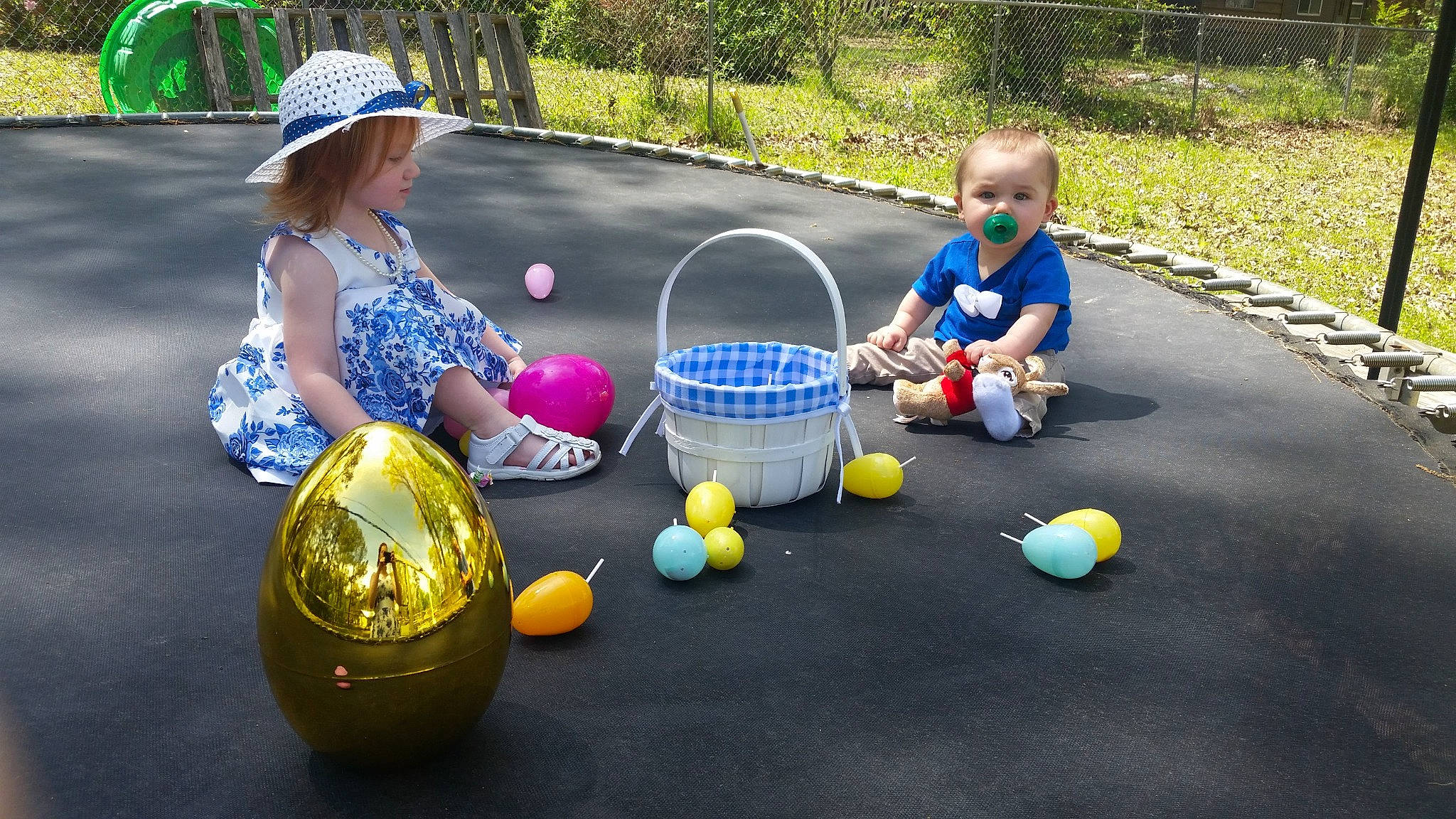 Atlas is registered to the contest to win money with this photo: asphalt, baby, child, community, fun, grass, hat, leisure, mammal, outdoor_recreation, person, photograph, plant, public_space, recreation, sports_equipment, summer, toddler, toy, tree