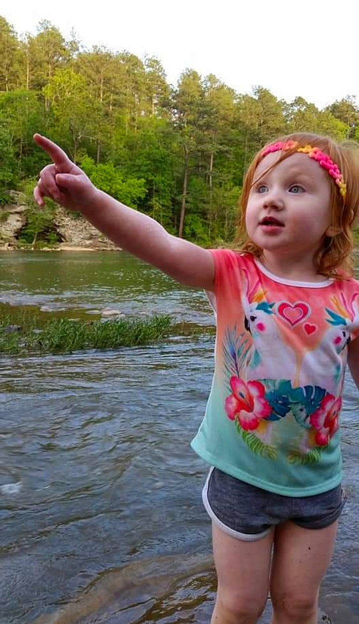 Talia joined the competition — help win amazing prizes! baby_toddler_clothing, body_of_water, fun, gesture, grass, happy, headwear, lake, leisure, magenta, nature, person, pink, plant, recreation, sky, sleeve, summer, t_shirt, toddler