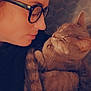 abyssinian, accessories, adult, animal, bodypart, cat, couch, face, female, finger, furniture, glasses, hand, head, kitten, person, pet, photography, portrait, woman