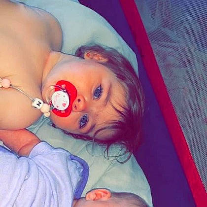 Zélie participe au concours pour gagner de l'argent avec cette photo : azure, baby, baby_toddler_clothing, cheek, chest, eye, eyebrow, eyelash, facial_expression, finger, gesture, happy, head, iris, lip, mouth, nose, person, pink, plant