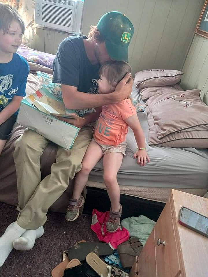 Carmen joined the competition — help win amazing prizes! baseball_cap, cap, child, comfort, event, flip_flops, fun, human_body, human_leg, lap, leg, leisure, person, sandal, shipping_box, shorts, sneakers, sock, t_shirt, thigh