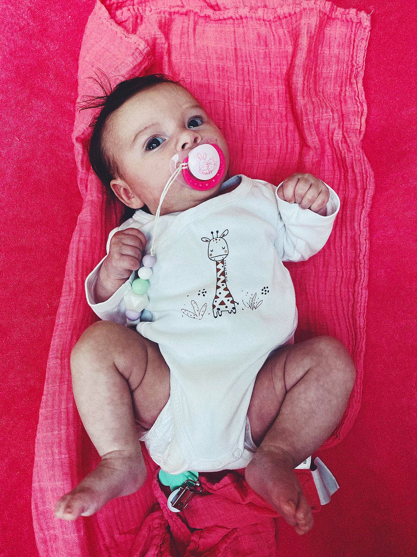 Carlota a rejoint le concours — aidez-le/la à gagner de superbes lots ! baby, baby_products, baby_toddler_clothing, cheek, child, person, pink, product, skin, smile, toddler