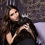 Blackie joined the competition — help win amazing prizes! woman, cat, black_cat, crown, portrait, indoor, long_hair, furry, pet, holding, jewelry, bracelet, ring, purple_blanket, decorative_wall, facial_expression, closeup, furniture, candid, cute