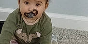 Karla joined the competition — help win amazing prizes! baby, carpet, casual, child, clothing, curious, cute, floor, furniture, home, indoor, looking, pacifier, person, play, sitting, table, toddler, toy, young_child