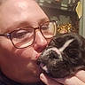 Verso a rejoint le concours — aidez-le/la à gagner de superbes lots ! affection, black_and_white, close_up, companion, cozy, decorations, dog, face, glasses, hand, home, indoors, kiss, person, pet, portrait, puppy, selfie, shelf, sleepy