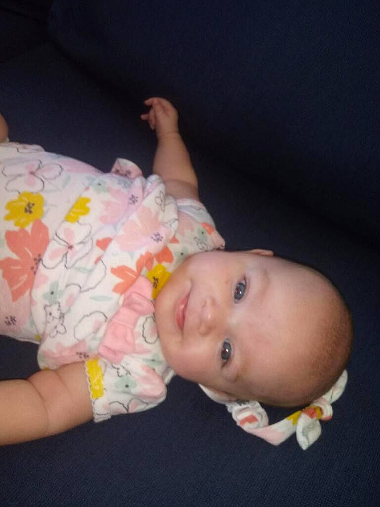 Paisley is registered to the contest to win money with this photo: abdomen, baby, baby_products, baby_toddler_clothing, cheek, child, comfort, eye, happy, headgear, human_body, iris, joy, lip, mouth, nose, pattern, person, skin, sleeve