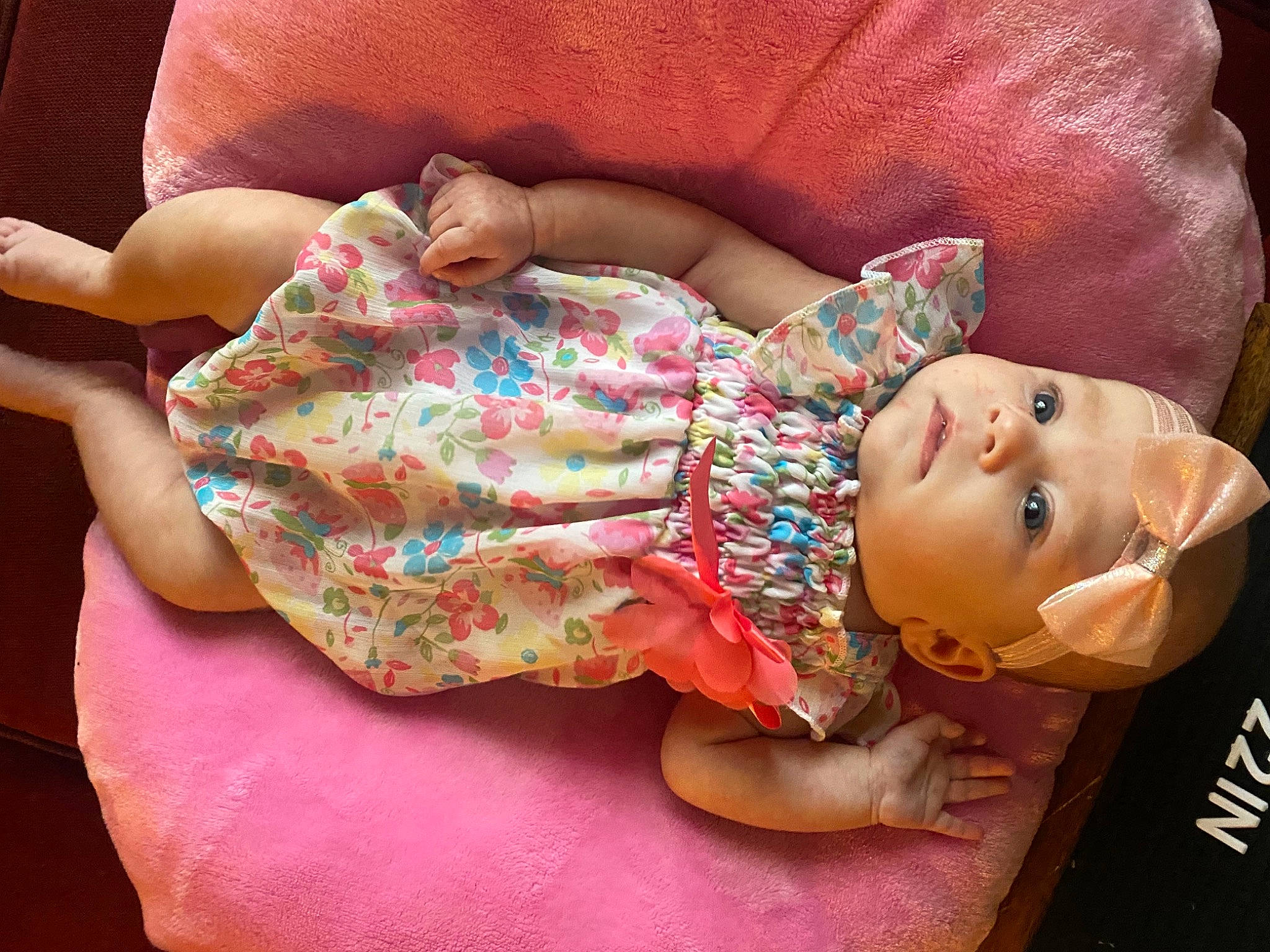 Paisley is registered to the contest to win money with this photo: baby, baby_sleeping, baby_toddler_clothing, cheek, child, comfort, headwear, human_body, joint, mouth, neck, orange, pattern, person, pink, skin, sleeve, textile, thigh, toddler