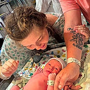 Zoey joined the competition — help win amazing prizes! newborn, baby, hospital, parents, mother, father, baby_hat, diaper, blanket, hospital_gown, tattoo, hospital_bracelet, family, love, medical_equipment, infant, skin_to_skin, happy, indoor, care