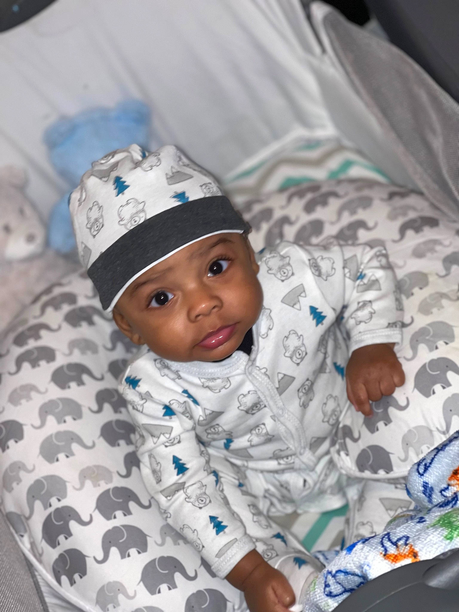 Cannon joined the competition — help win amazing prizes! baby, baby_toddler_clothing, cap, child, comfort, electric_blue, fun, happy, headgear, headwear, linens, pattern, person, portrait_photography, room, sitting, sleeve, smile, textile, toddler