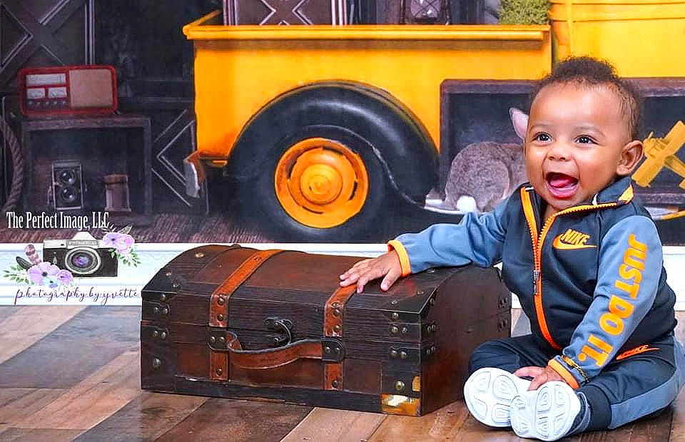 Cannon joined the competition — help win amazing prizes! automotive_tire, automotive_wheel_system, baby_toddler_clothing, bag, baggage, briefcase, fun, leisure, luggage_and_bags, machine, motor_vehicle, person, photograph, sitting, smile, snapshot, tire, toddler, travel, wheel