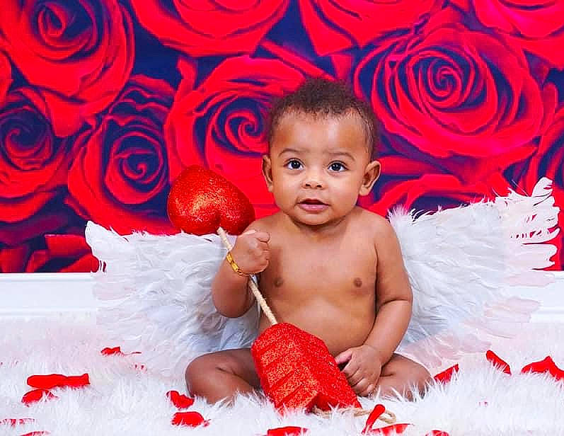Cannon joined the competition — help win amazing prizes! baby, baby_toddler_clothing, cheek, child, facial_expression, flash_photography, flower, fun, happy, human, magenta, muscle, pattern, person, petal, photograph, pink, red, rose, skin