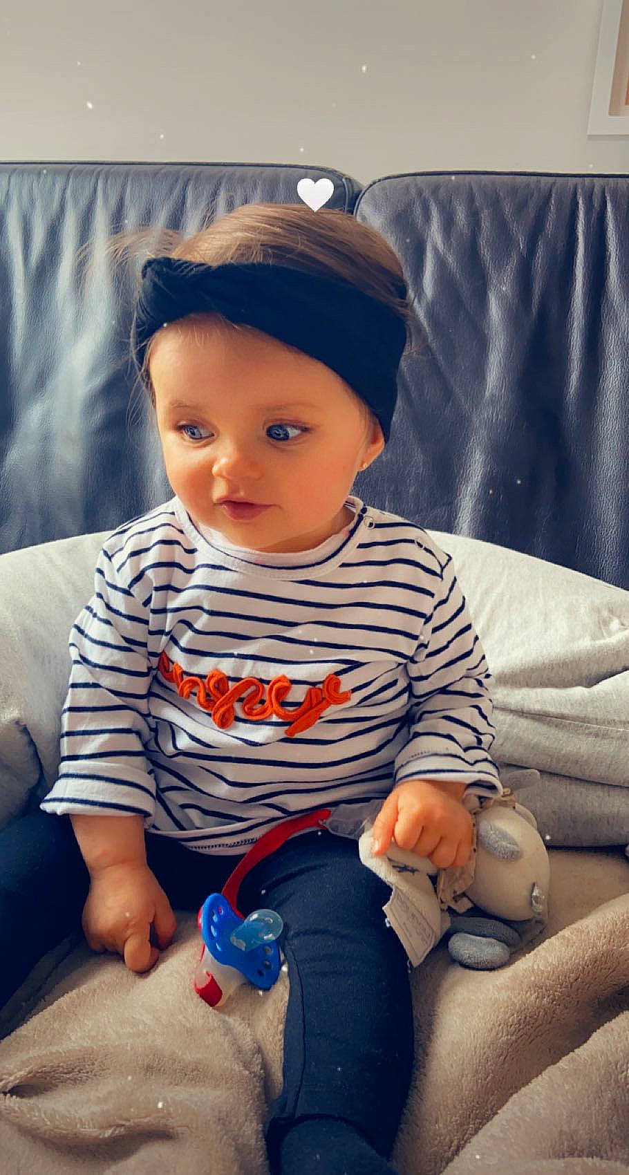 Louna participe au concours pour gagner de l'argent avec cette photo : arm, baby, baby_toddler_clothing, cap, cheek, child, comfort, cool, electric_blue, facial_expression, finger, flash_photography, fun, happy, headwear, person, sitting, skin, sleeve, standing