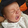 Sofiane a rejoint le concours — aidez-le/la à gagner de superbes lots ! baby, baseballcap, blanket, bodypart, bonnet, cap, clothing, cushion, face, happy, hat, head, homedecor, laughing, mouth, newborn, person, photography, portrait, sleeping