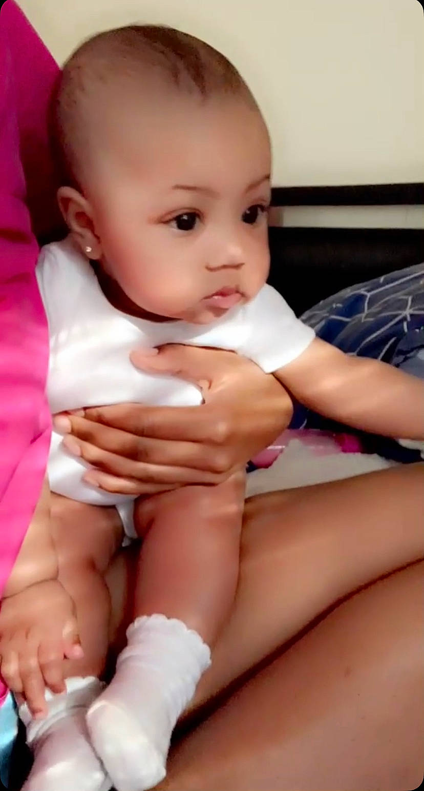 Kai joined the competition — help win amazing prizes! arm, baby_toddler_clothing, cheek, chin, comfort, finger, gesture, hand, human_body, joint, leg, lip, muscle, neck, person, pink, skin, sleeve, stomach, thigh