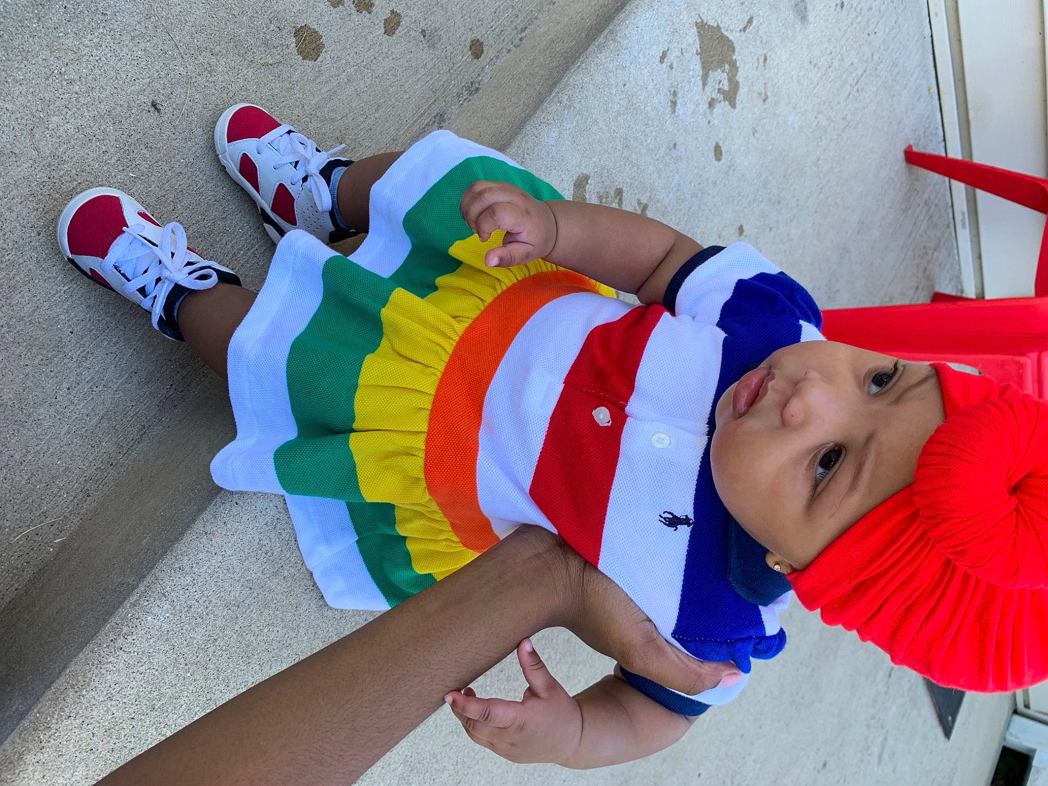 Kai is registered to the contest to win money with this photo: baby_toddler_clothing, carmine, child, elbow, electric_blue, foot, fun, happy, hat, headwear, human_leg, knee, leisure, person, product, sock, t_shirt, textile, thigh, thumb