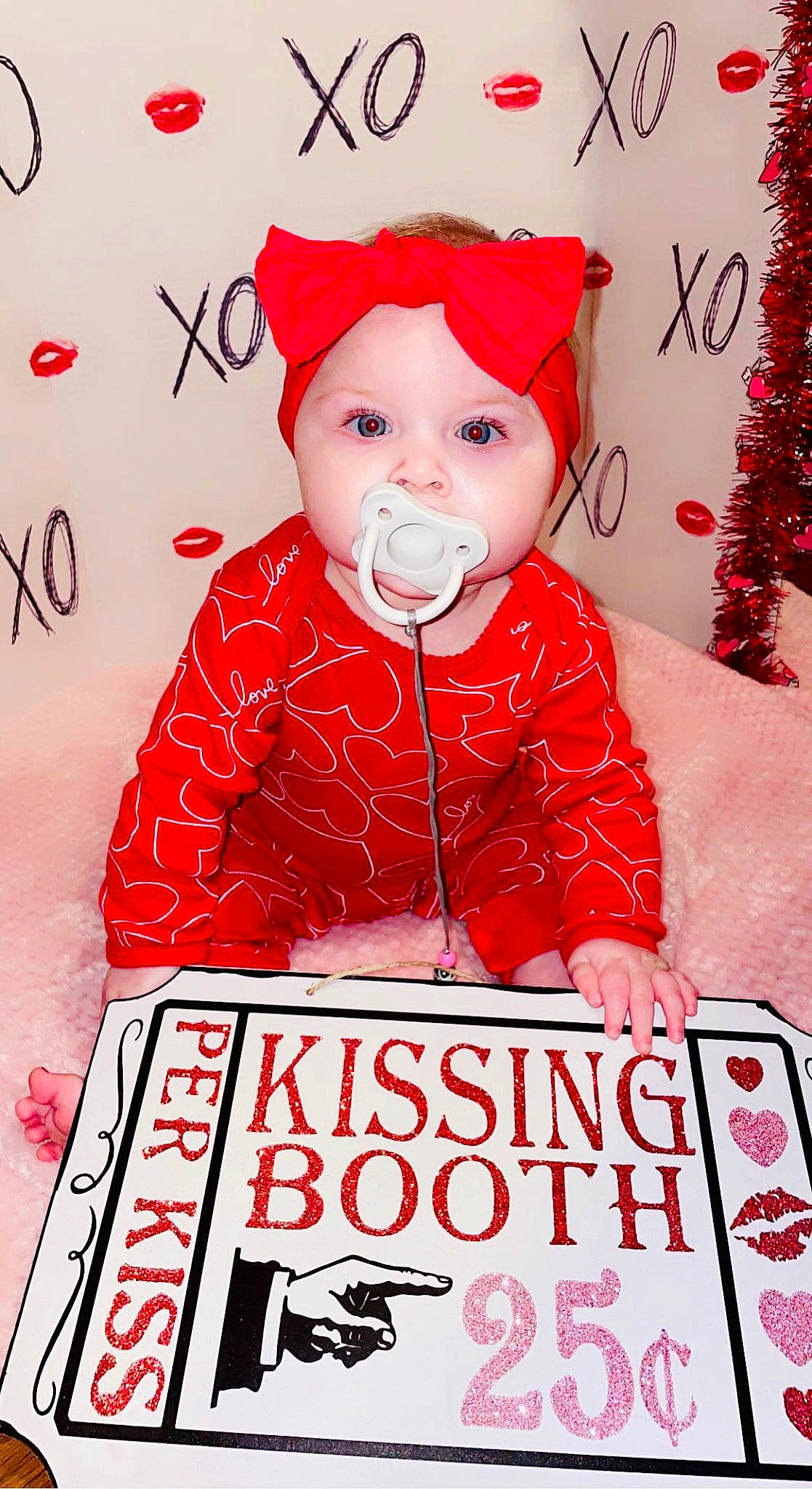 Kinsley is registered to the contest to win money with this photo: baby, baby_toddler_clothing, carmine, child, christmas_eve, design, event, facial_expression, font, happy, headwear, holiday, pattern, person, photograph, pink, product, red, sleeve, smile