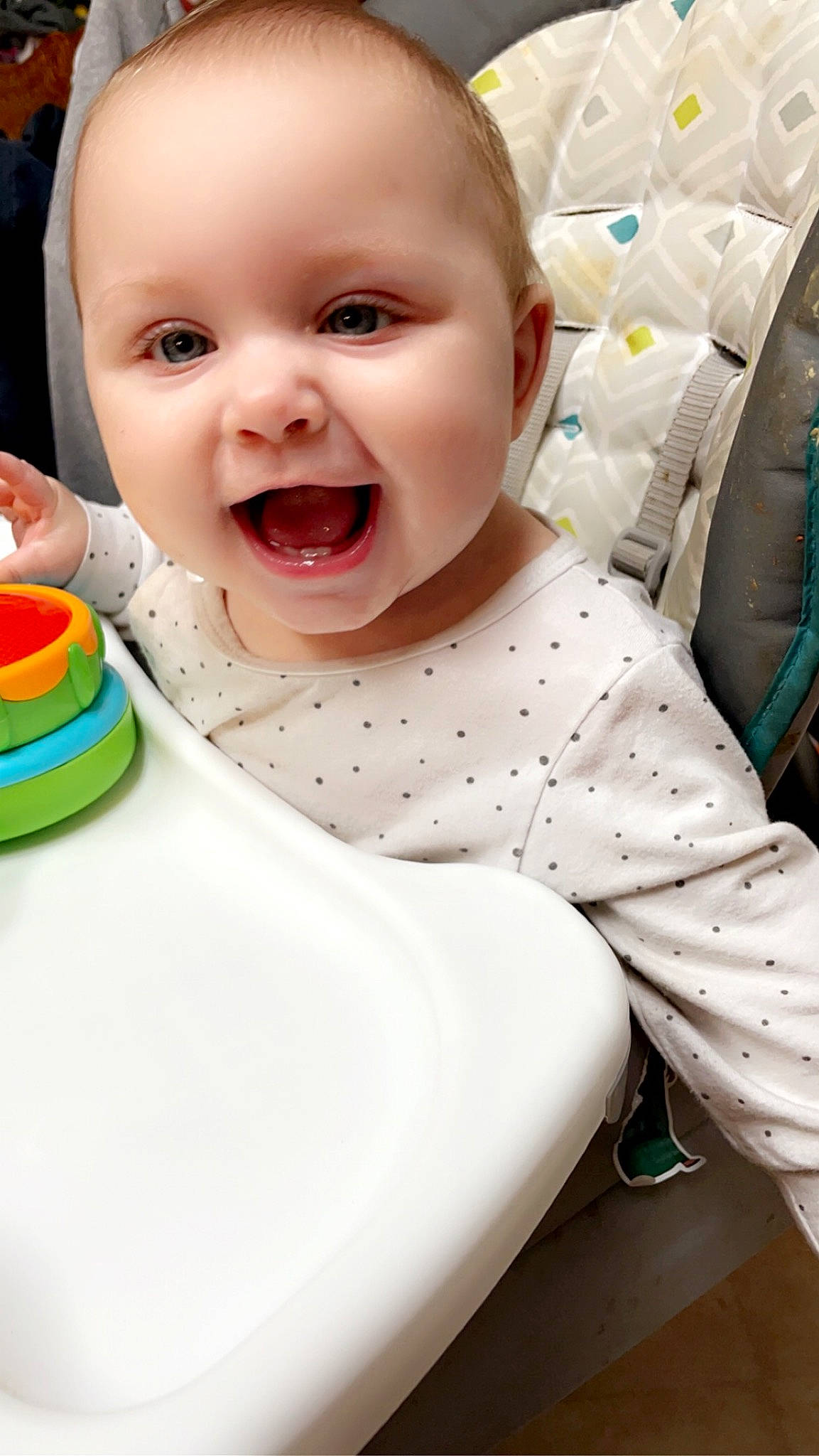 Kinsley joined the competition — help win amazing prizes! baby, baby_laughing, baby_playing_with_toys, baby_products, baby_toddler_clothing, bib, cheek, child, comfort, dishware, fun, happy, laugh, pattern, person, sitting, skin, sleeve, smile, tableware