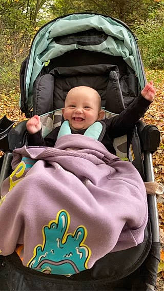 Westley is registered to the contest to win money with this photo: baby, baby_carriage, baby_products, baby_toddler_clothing, cheek, child, comfort, fun, grass, green, happy, joy, leisure, person, photograph, product, recreation, sitting, smile, snapshot