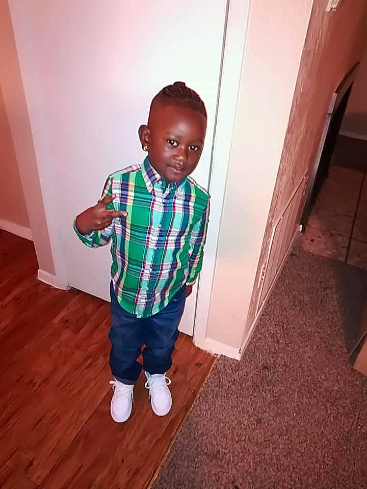 De'Nyrian Young is registered to the contest to win money with this photo: child, floor, flooring, hardwood, person, play, room, shoe, standing, t_shirt, toddler, trunk, wood