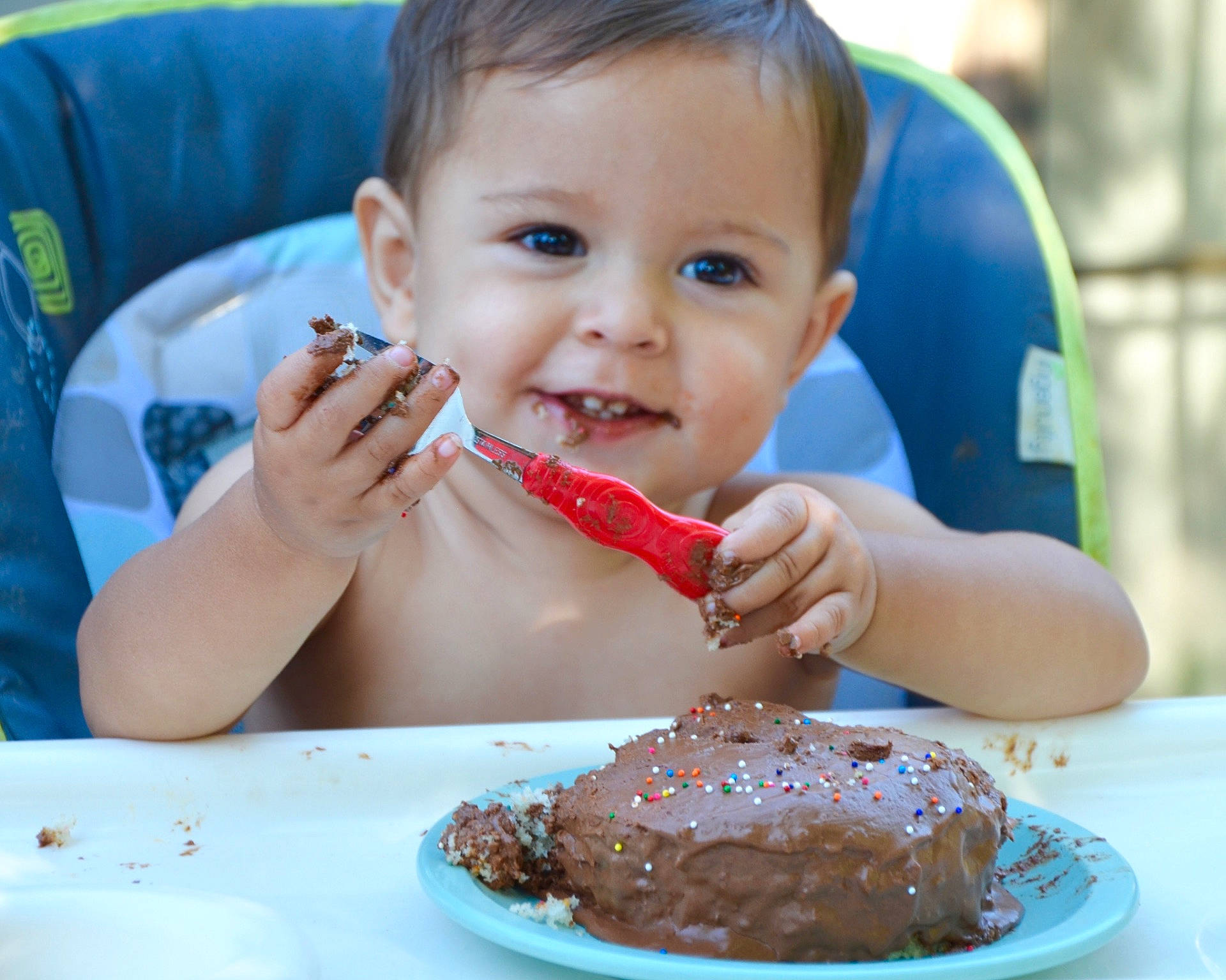 Colt is registered to the contest to win money with this photo: baked_goods, baking, birthday, cake, child, dessert, eating, food, joy, person, sweetness, toddler, torte