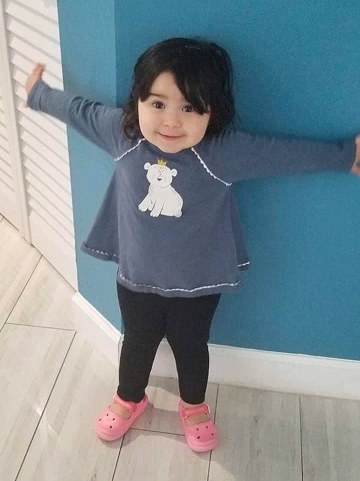 Valkiria joined the competition — help win amazing prizes! black_hair, child, head, joy, leg, neck, person, pink, shoulder, skin, sleeve, snapshot, standing, t_shirt, toddler